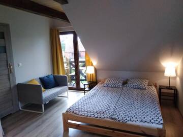 Фото номера Апартаменты с балконом Фермерские дома Mazurska Zagroda Apartamenty г. Рыдзево 3