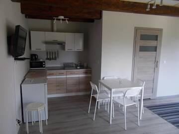 Фото номера Апартаменты с балконом Фермерские дома Mazurska Zagroda Apartamenty г. Рыдзево 6