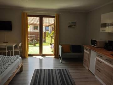 Фото номера Апартаменты с террасой Фермерские дома Mazurska Zagroda Apartamenty г. Рыдзево 6